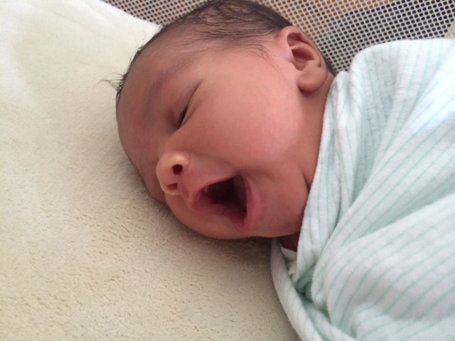 newborn yawning